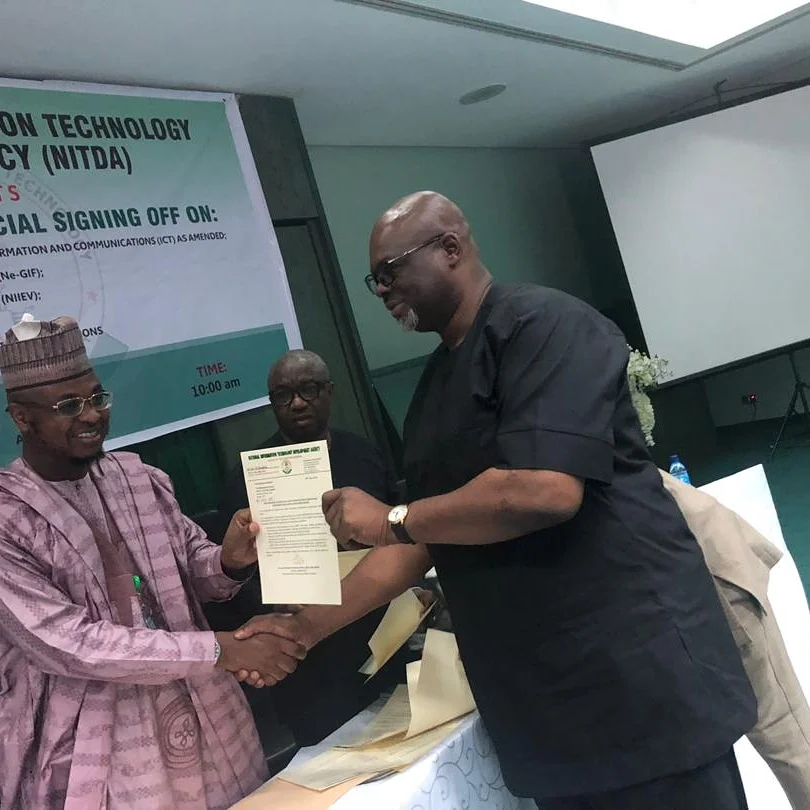 Akin Oyegoke receiving Data Protection Compliance Organisation Certificate